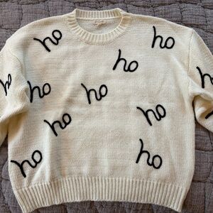 Festive Cream Sweater with Black Lettering